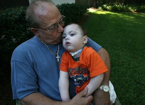 Richard Cosmillo holds his grandson, Joey Cosmillo